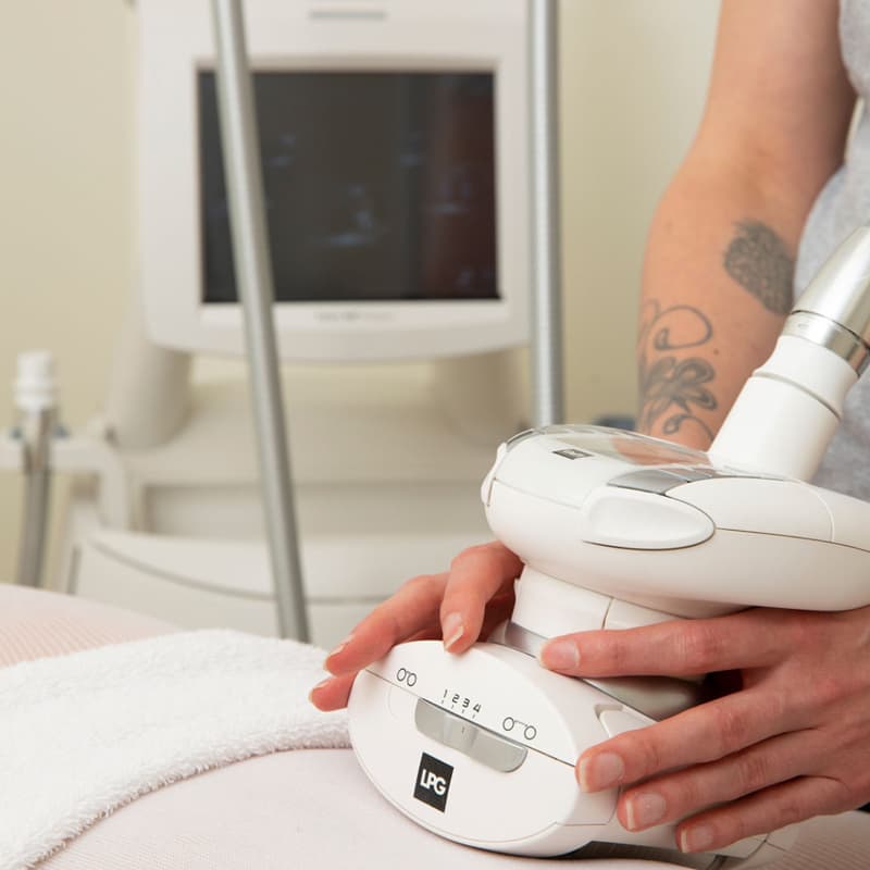 Odettes Endermologie Technician with LPG machine close up